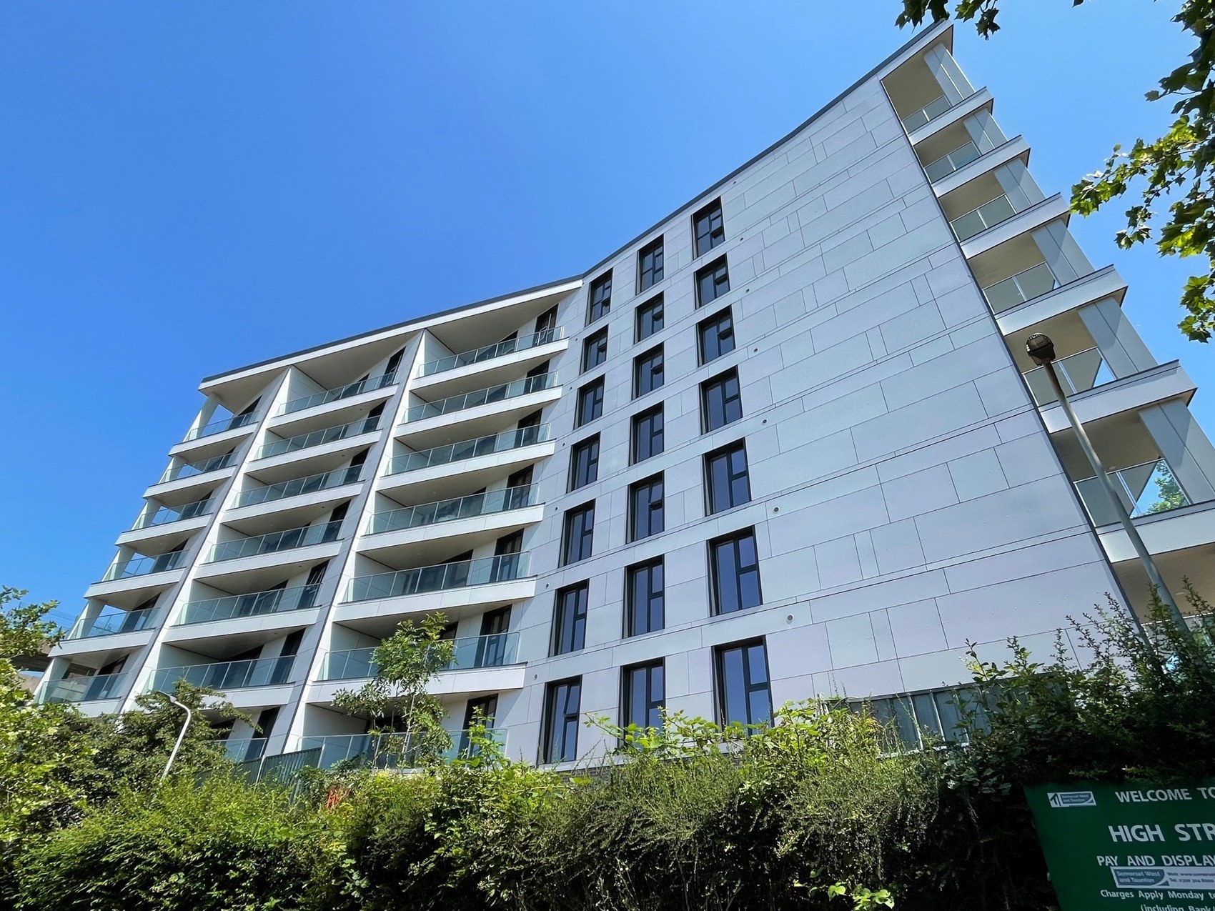 Exterior of Quantock House in Taunton, showing balconies and facade cladding.