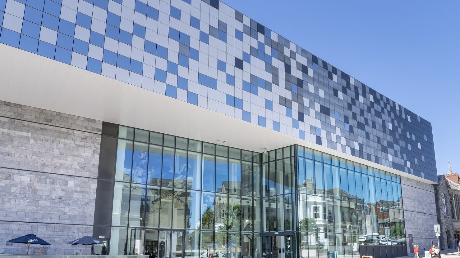 The completed exterior of The Box in Plymouth, showing its cantilevered archive and glazed entrance.